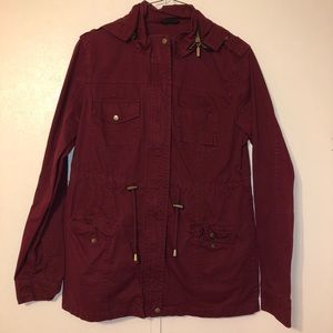 Women’s burgundy hooded jacket.